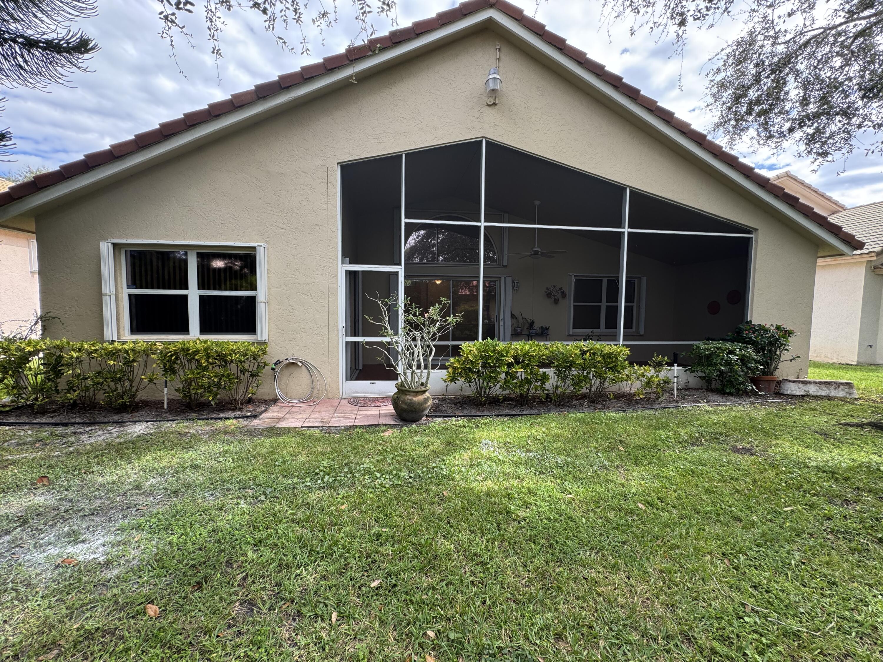 2705 Pointe Circle Greenacres, FL 33413 - Photo 31 of 46 Rear View