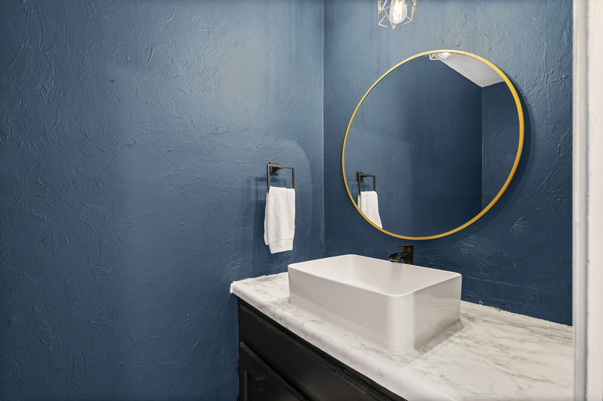 1942 Allenby Road Germantown, TN 38139 - Photo 18 of 34 Bathroom with a textured wall and vanity