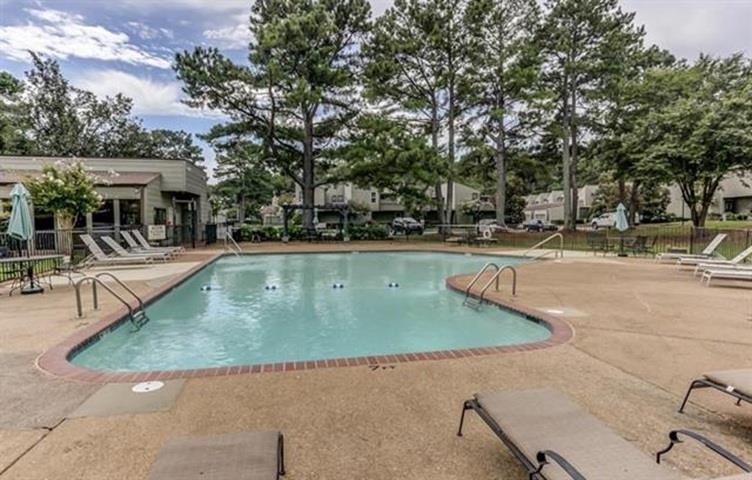 1942 Allenby Road Germantown, TN 38139 - Photo 32 of 34 Community pool with a patio area