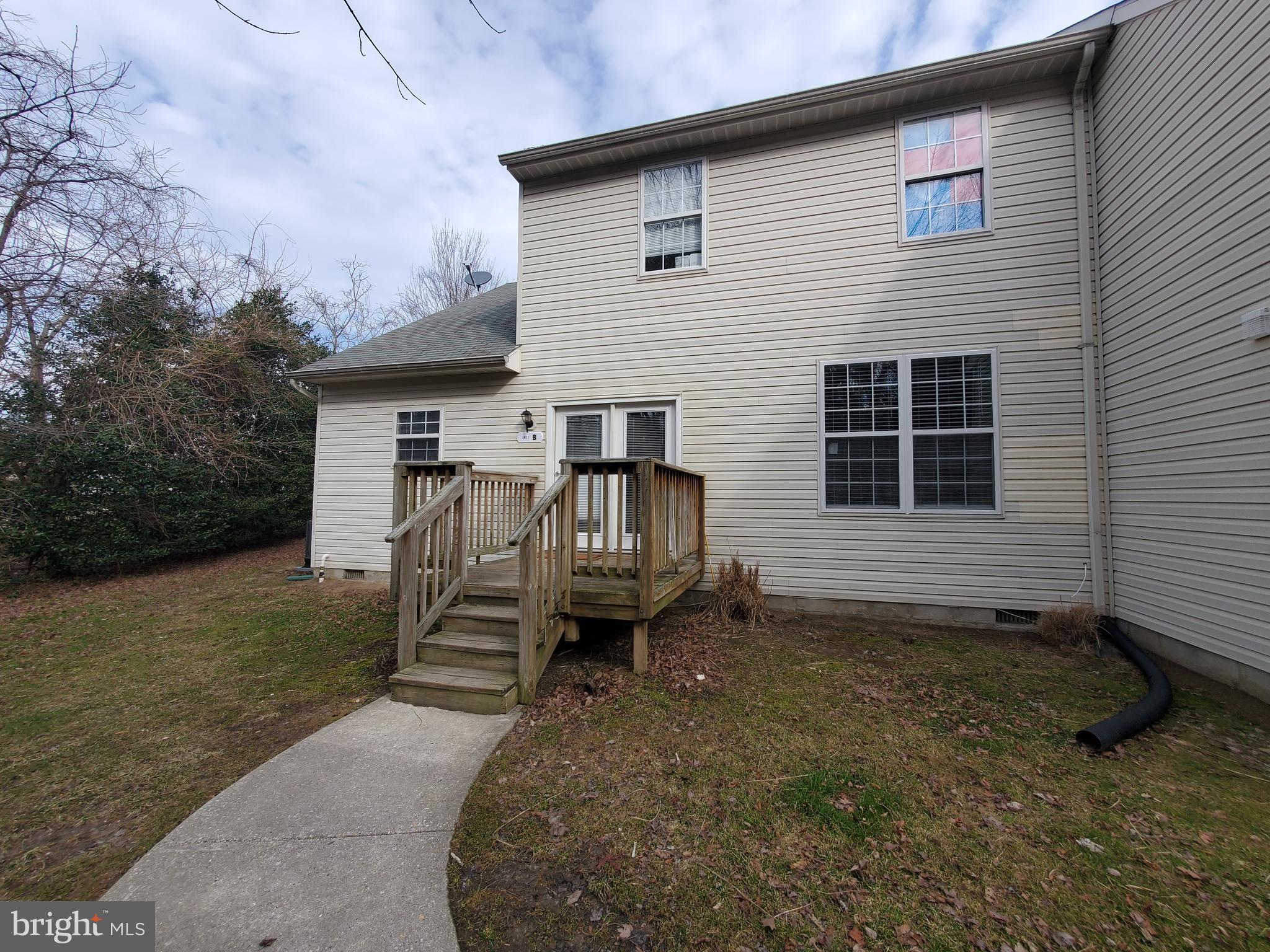 1606 Postal Road, Unit B Chester, MD 21619 - Photo 1 of 13 Deck Entrance off parking Lot