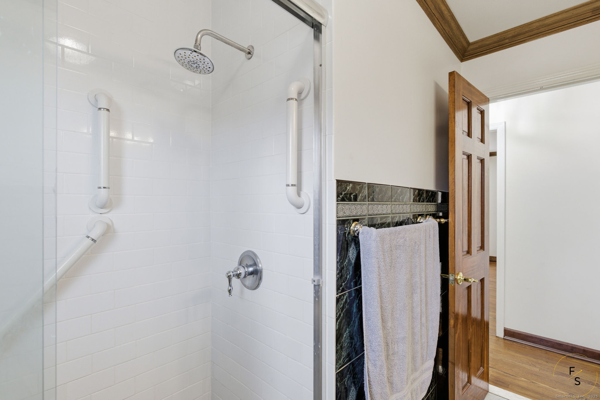 29 Priscilla Road Norwalk, CT 06850 - Photo 19 of 40 a bathroom with a shower and a glass door