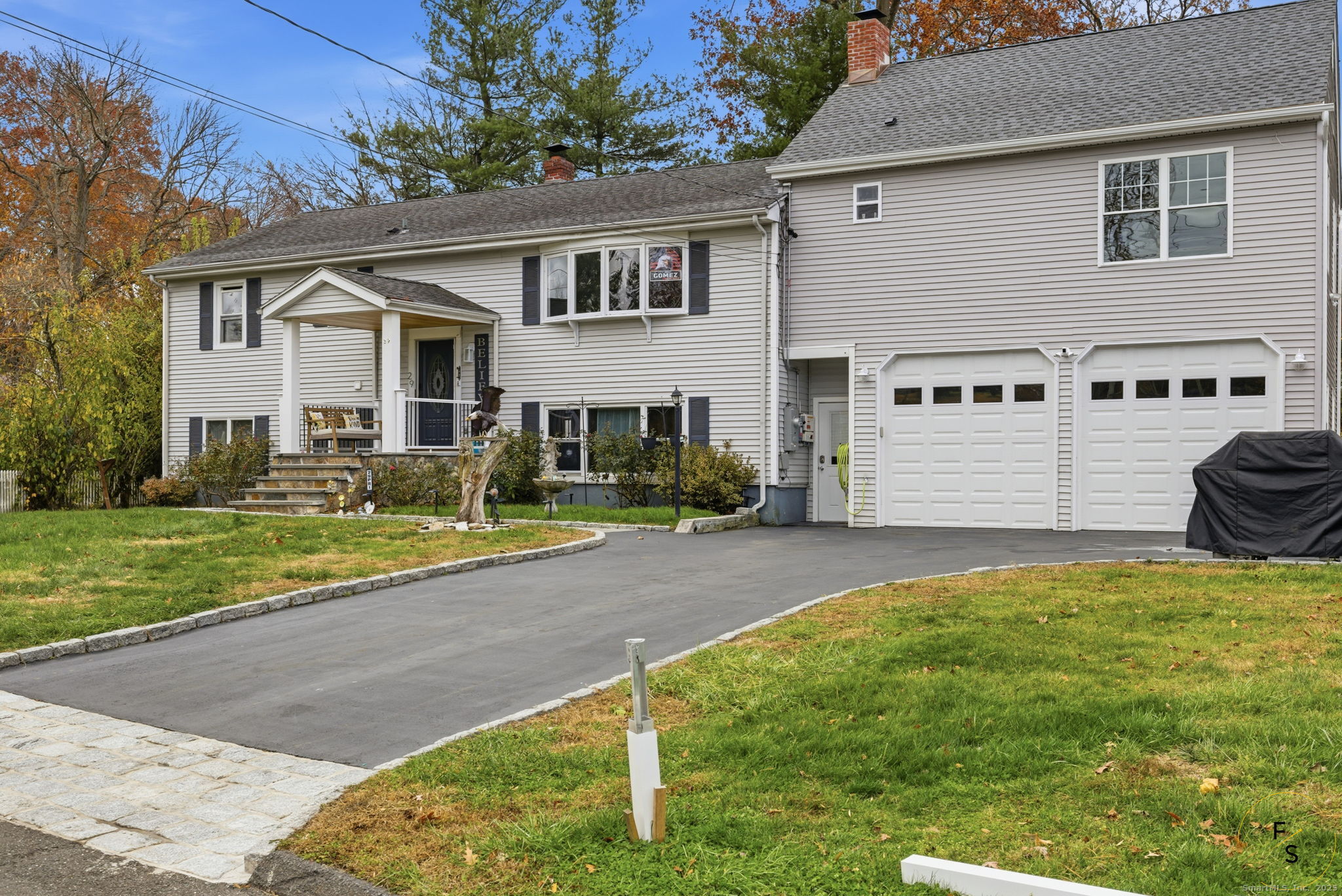 29 Priscilla Road Norwalk, CT 06850 - Photo 2 of 40 a front view of a house with a yard