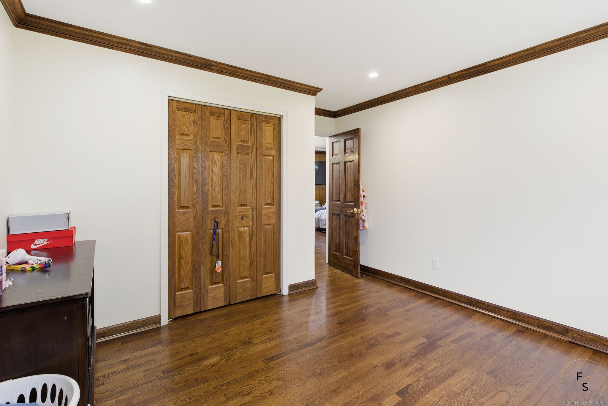 29 Priscilla Road Norwalk, CT 06850 - Photo 21 of 40 a view of an empty room with wooden floor