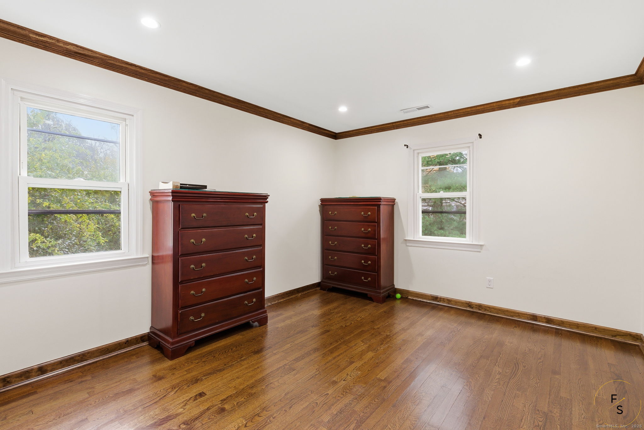 29 Priscilla Road Norwalk, CT 06850 - Photo 23 of 40 an empty room with windows and closet