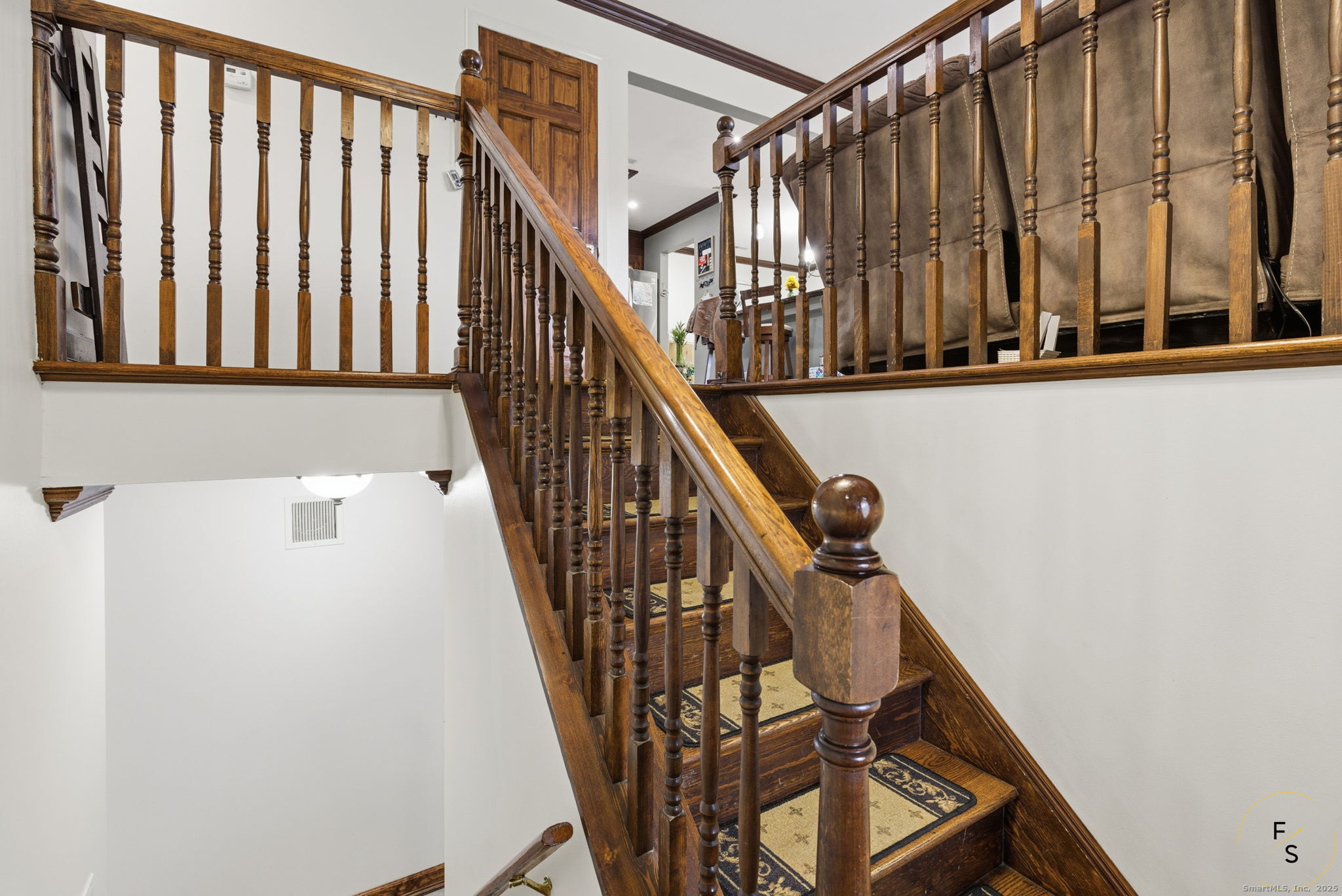 29 Priscilla Road Norwalk, CT 06850 - Photo 26 of 40 a view of staircase with wooden floor and white walls