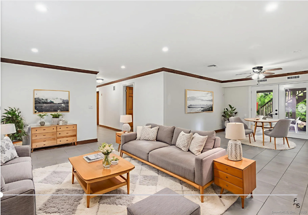 29 Priscilla Road Norwalk, CT 06850 - Photo 32 of 40 a living room with furniture and wooden floor