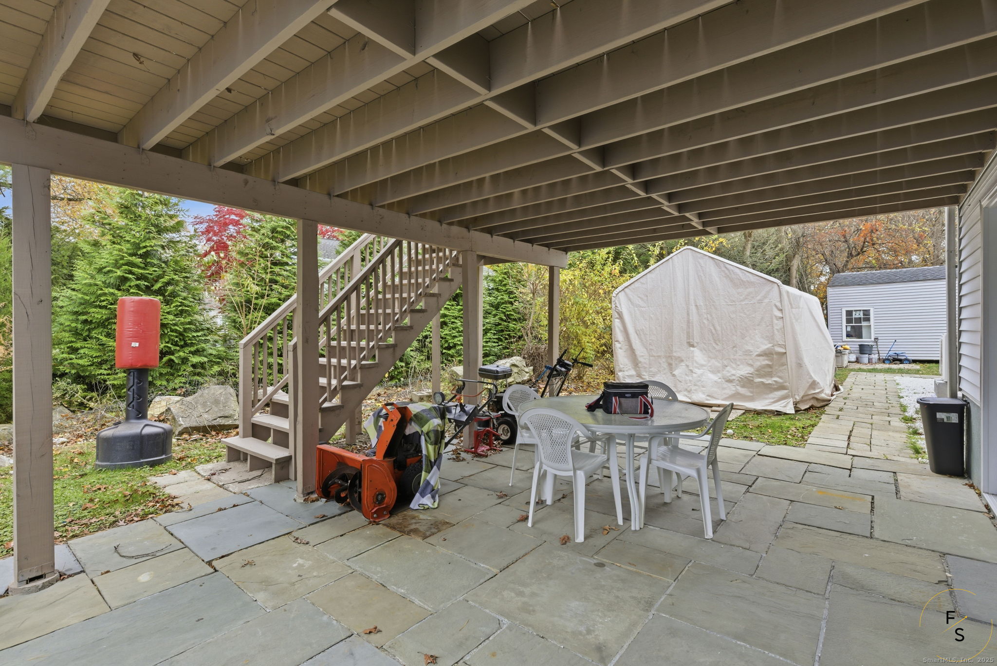 29 Priscilla Road Norwalk, CT 06850 - Photo 38 of 40 a building outdoor space with patio furniture and potted plants