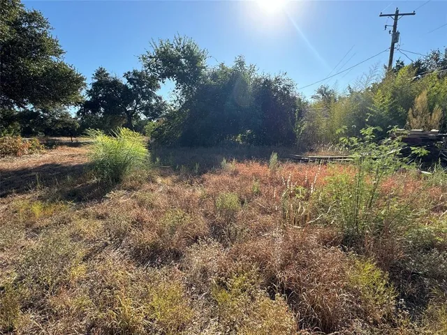 a view of lake with green space