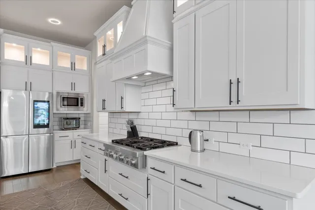 a bed room with a bed and a ceiling fan