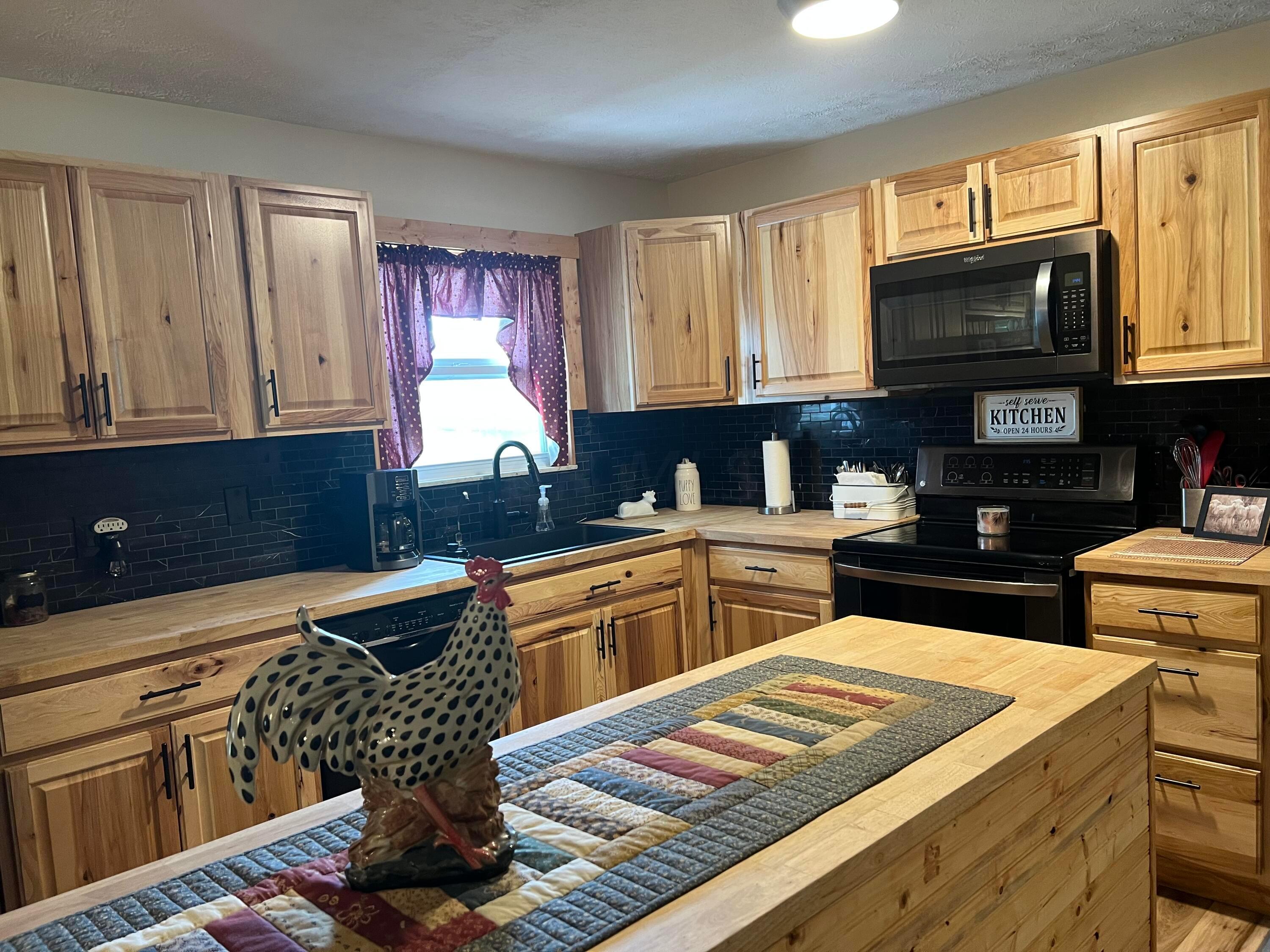 6271 Alkire Road Galloway, OH 43119 - Photo 8 of 27 Eat in kitchen. Butcher block countertops
