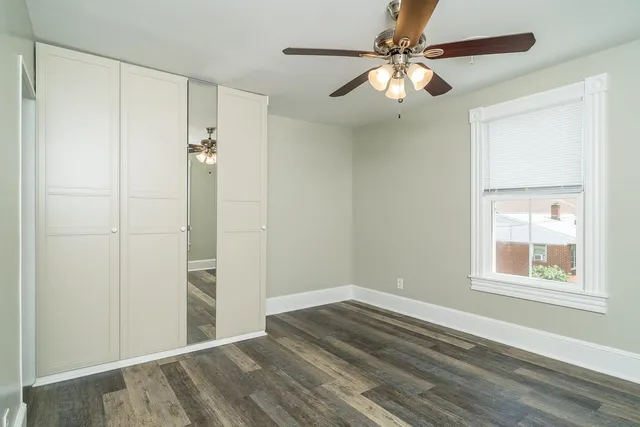 a view of a room that has a window in it