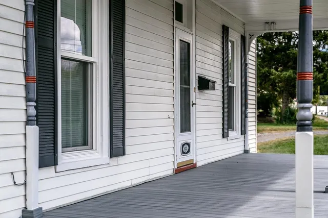 a view of a house with a roof deck