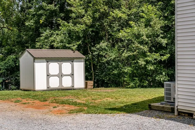 a view of a backyard with a garden