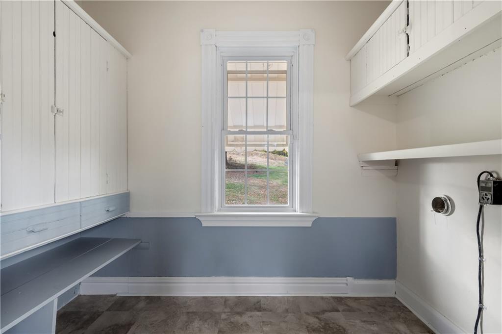 272 Shaffer Road Beaver Falls, PA 15010 - Photo 16 of 38 a view of an empty room with wooden floor and a window