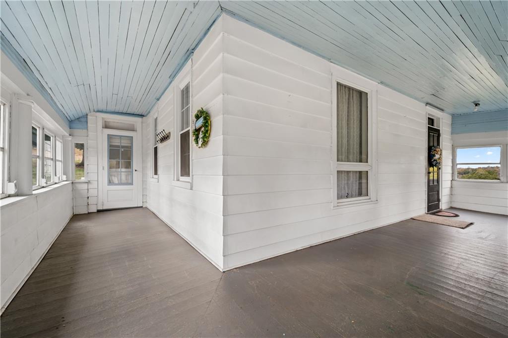 272 Shaffer Road Beaver Falls, PA 15010 - Photo 4 of 38 wooden floor in an empty room with a window