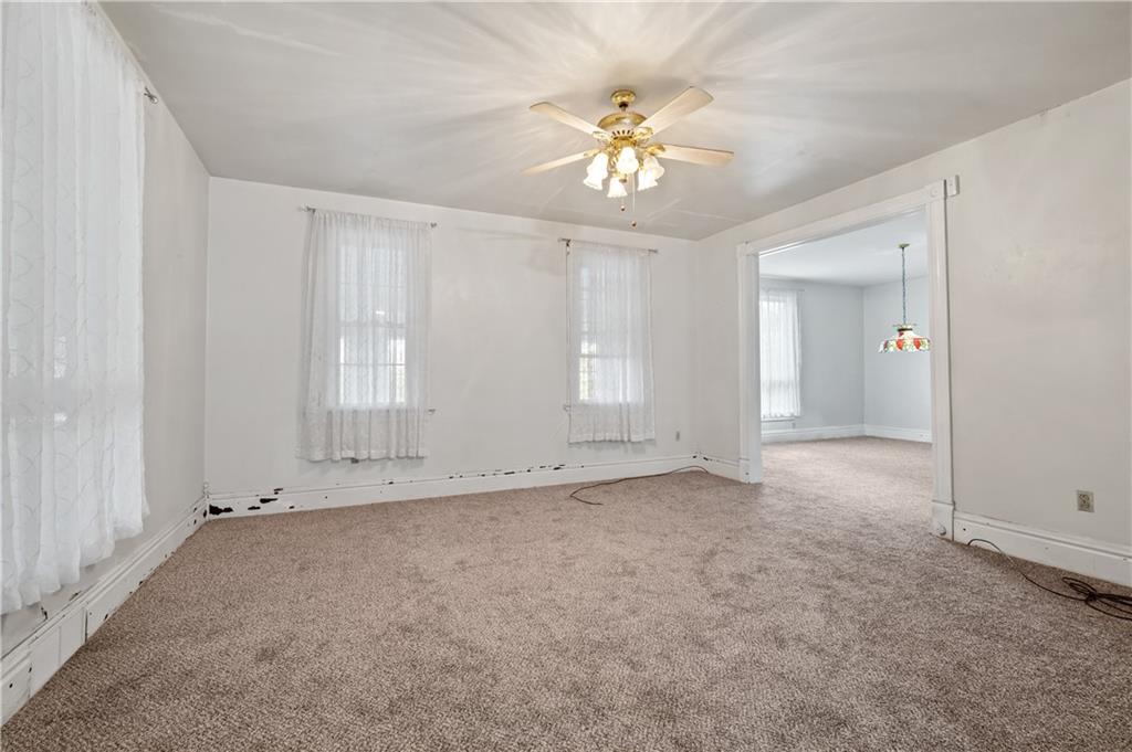 272 Shaffer Road Beaver Falls, PA 15010 - Photo 7 of 38 an empty room with chandelier fan