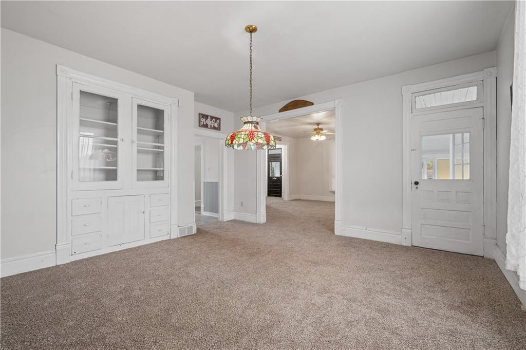 272 Shaffer Road Beaver Falls, PA 15010 - Photo 10 of 38 a view of a room with chandelier fan and kitchen view