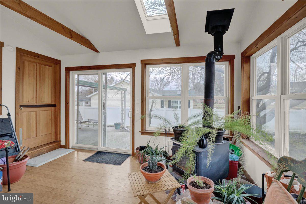 329 Dahlia Road Lancaster, PA 17602 - Photo 13 of 24 a view of a porch with furniture and a potted plant