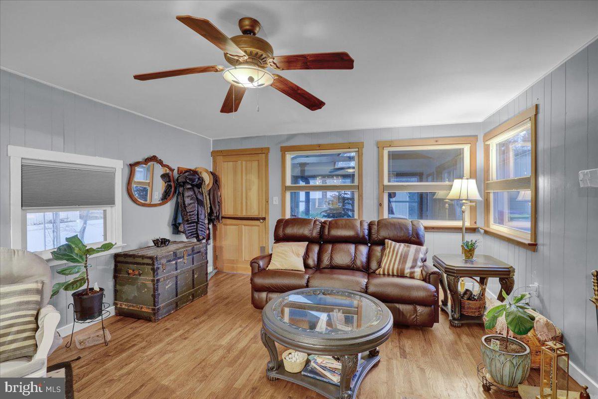 329 Dahlia Road Lancaster, PA 17602 - Photo 19 of 24 a living room with furniture a fireplace and a window