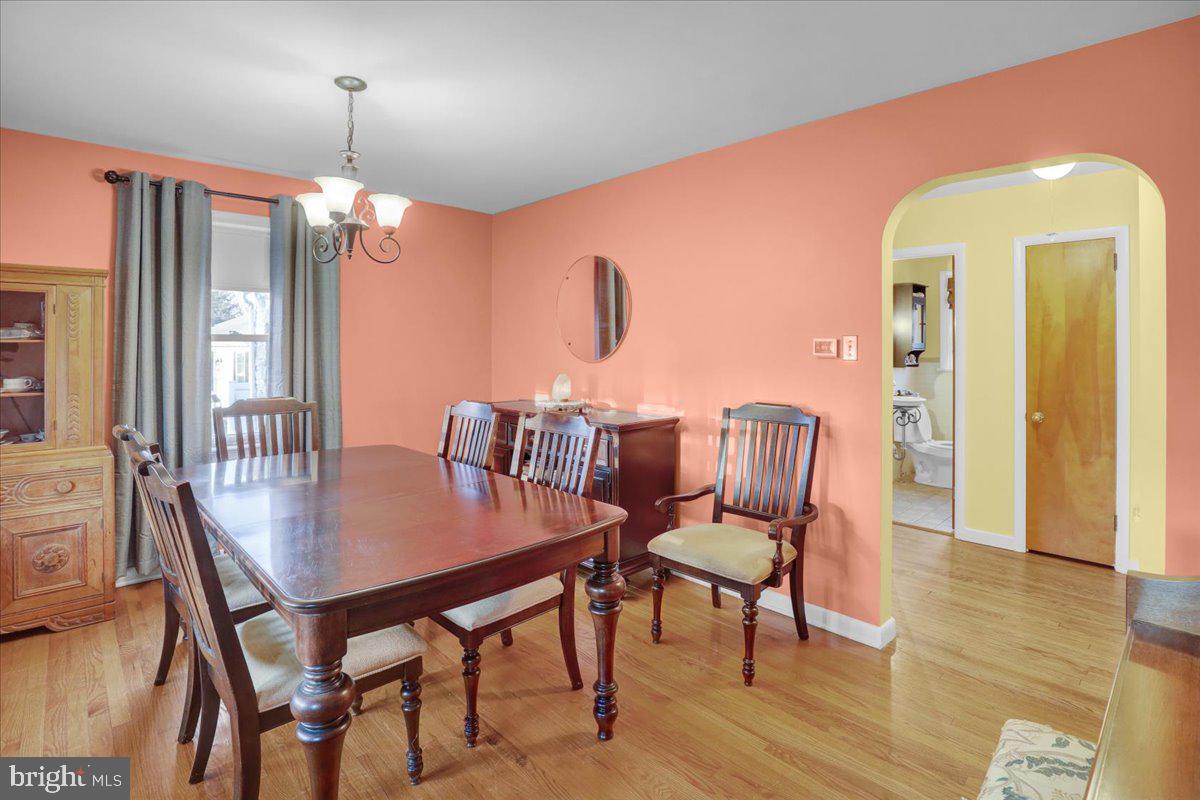 329 Dahlia Road Lancaster, PA 17602 - Photo 7 of 24 a view of a dining room with furniture and wooden floor