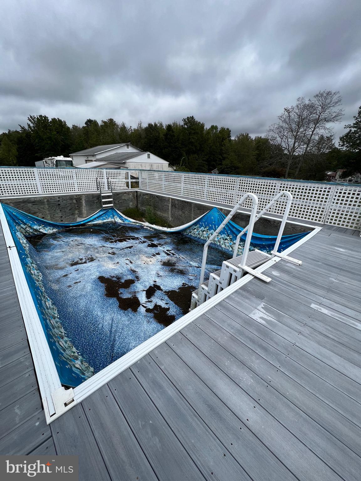 8640 Lowell Road Pomfret, MD 20675 - Photo 13 of 18 Pool from deck (needs new liner)