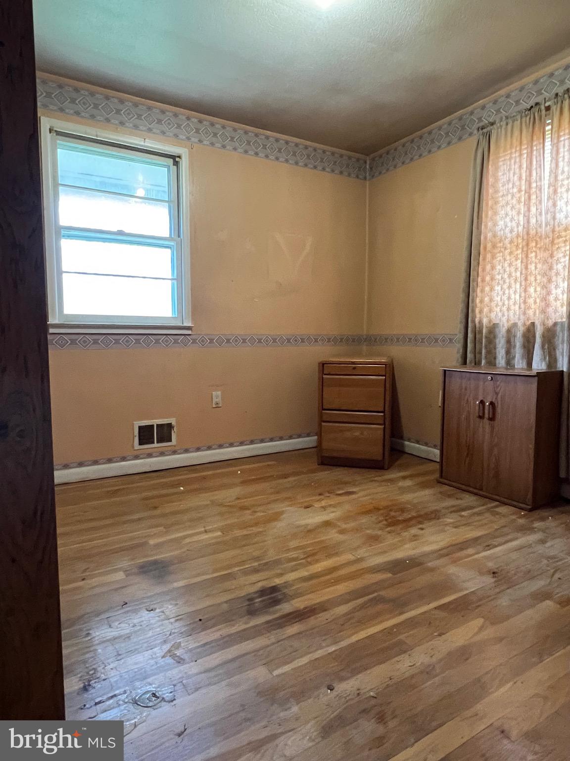 8640 Lowell Road Pomfret, MD 20675 - Photo 9 of 18 3rd Bedroom with Hardwood Flooring