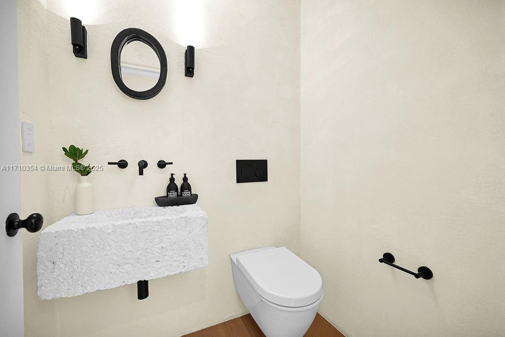 364 Southwest 30th Road Miami, FL 33129 - Photo 26 of 38 a bathroom with a sink and a toilet