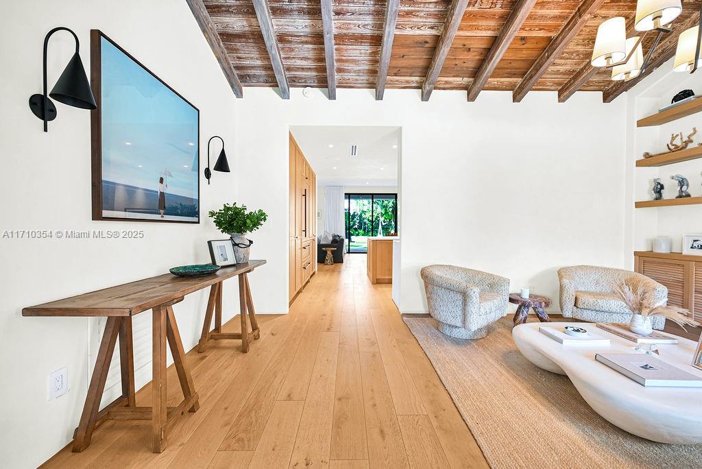364 Southwest 30th Road Miami, FL 33129 - Photo 3 of 38 a living room with furniture and a wooden floor