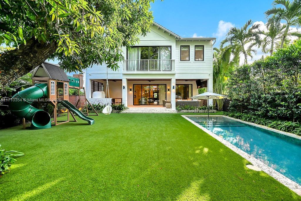 364 Southwest 30th Road Miami, FL 33129 - Photo 38 of 38 a front view of house with yard and outdoor seating