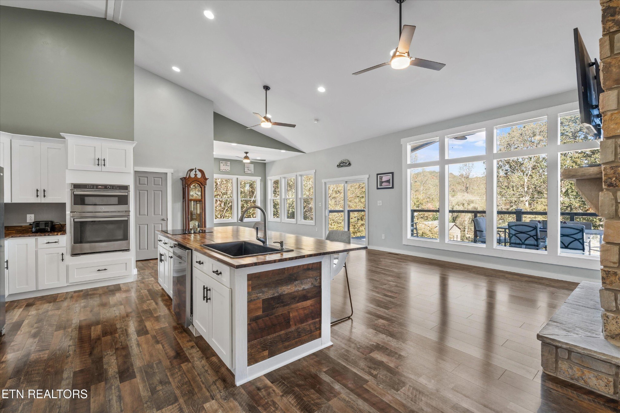 620 East Norris Point Road La Follette, TN 37766 - Photo 12 of 48 a kitchen with stainless steel appliances granite countertop a stove and a refrigerator