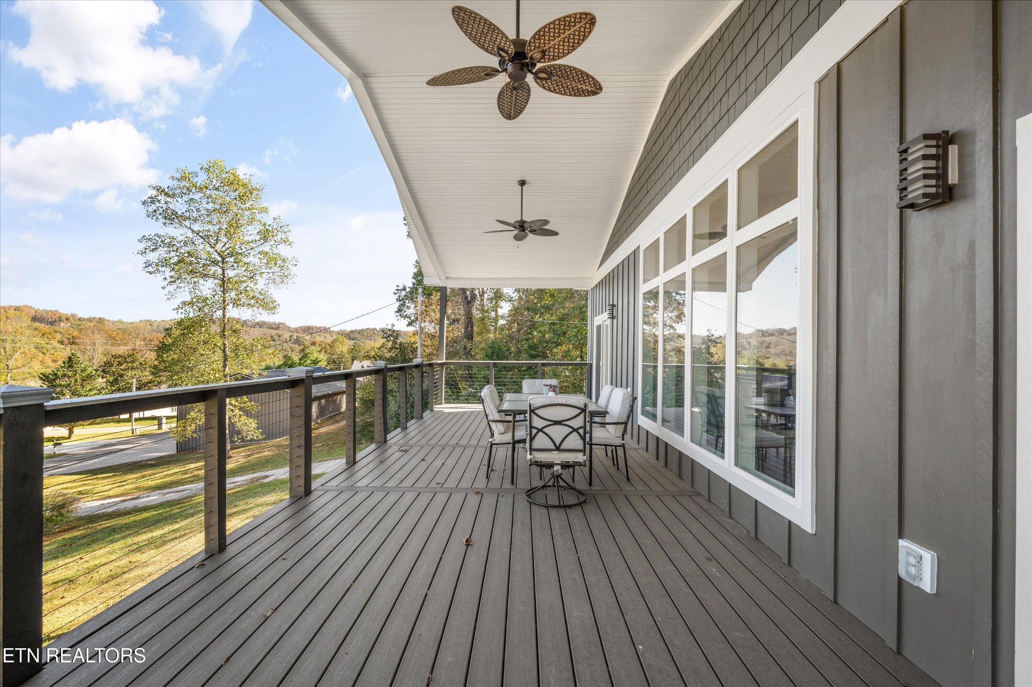 620 East Norris Point Road La Follette, TN 37766 - Photo 22 of 48 a view of a balcony with chairs