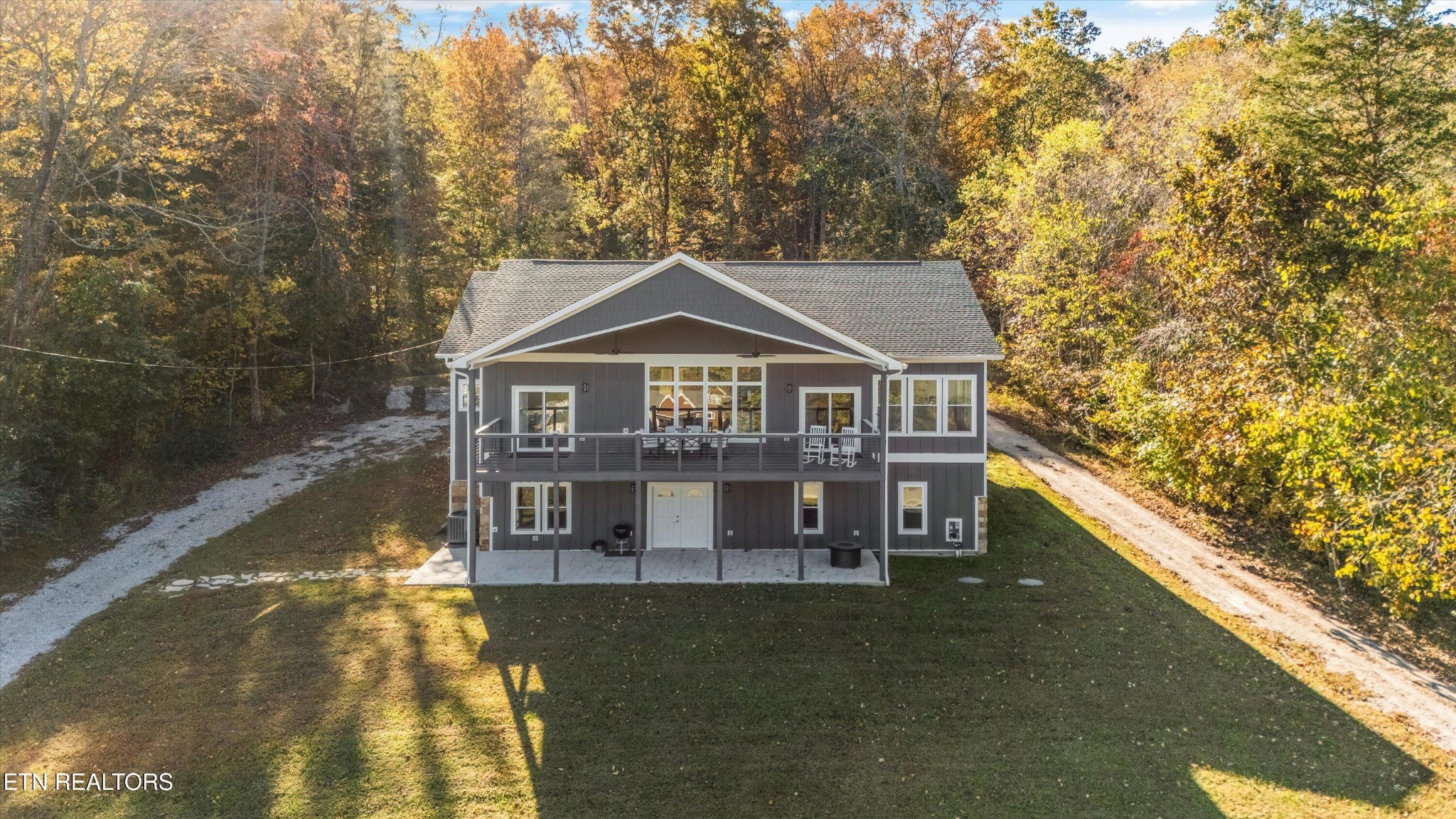620 East Norris Point Road La Follette, TN 37766 - Photo 3 of 48 a front view of a house with a yard