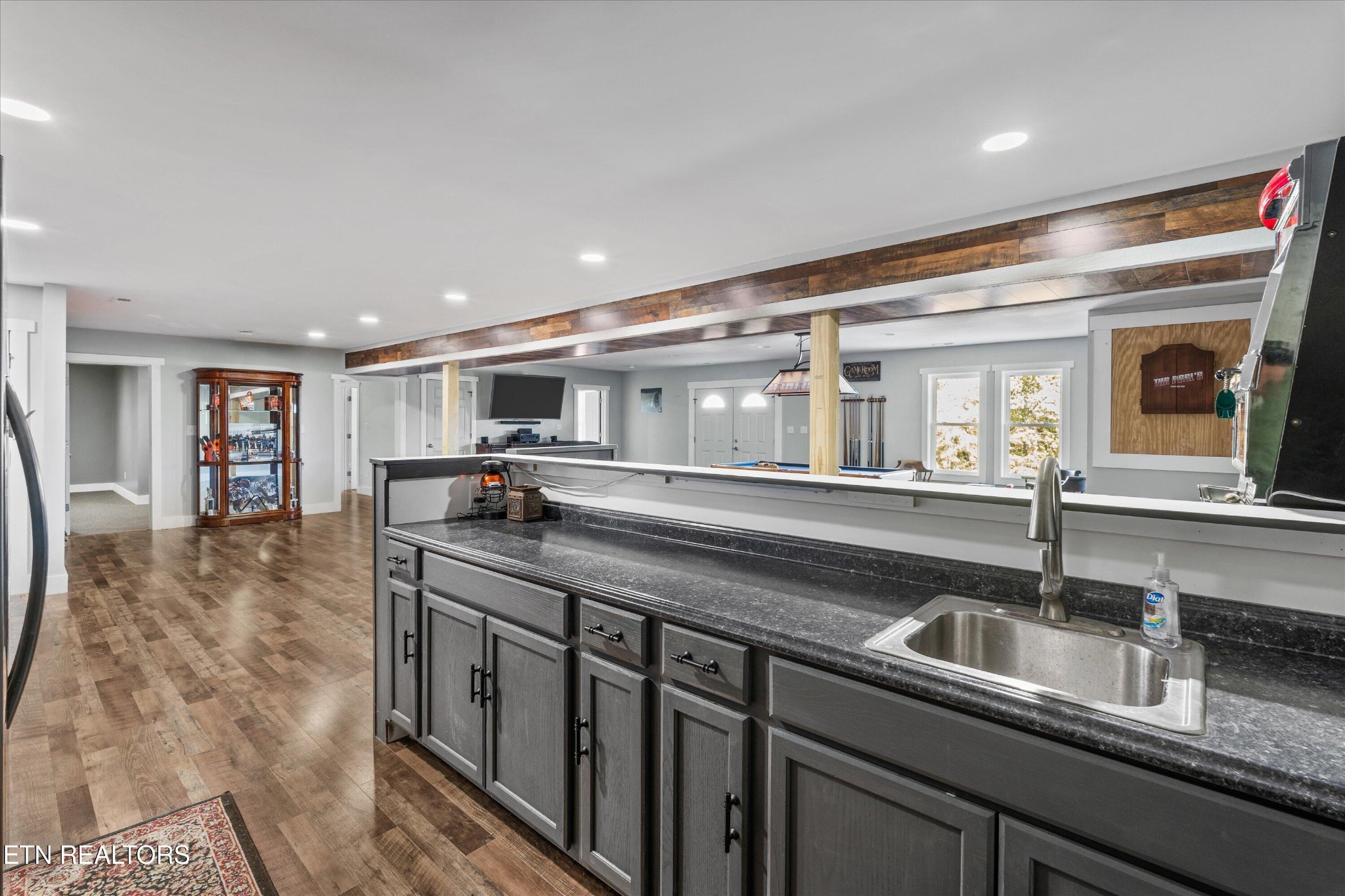 620 East Norris Point Road La Follette, TN 37766 - Photo 34 of 48 a kitchen with stainless steel appliances granite countertop a sink and stove