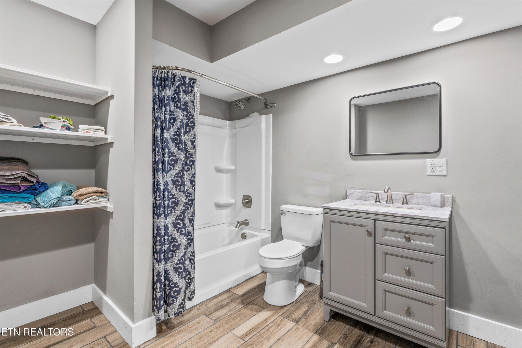 620 East Norris Point Road La Follette, TN 37766 - Photo 39 of 48 a bathroom with a sink toilet and shower