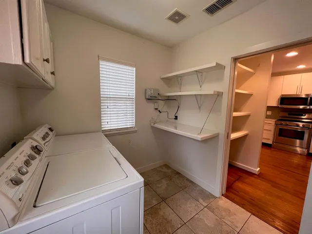 a room with storage and utility