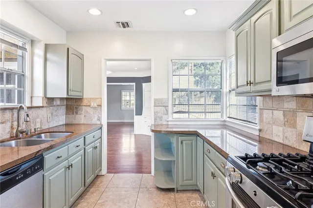 a bedroom with bed and a window