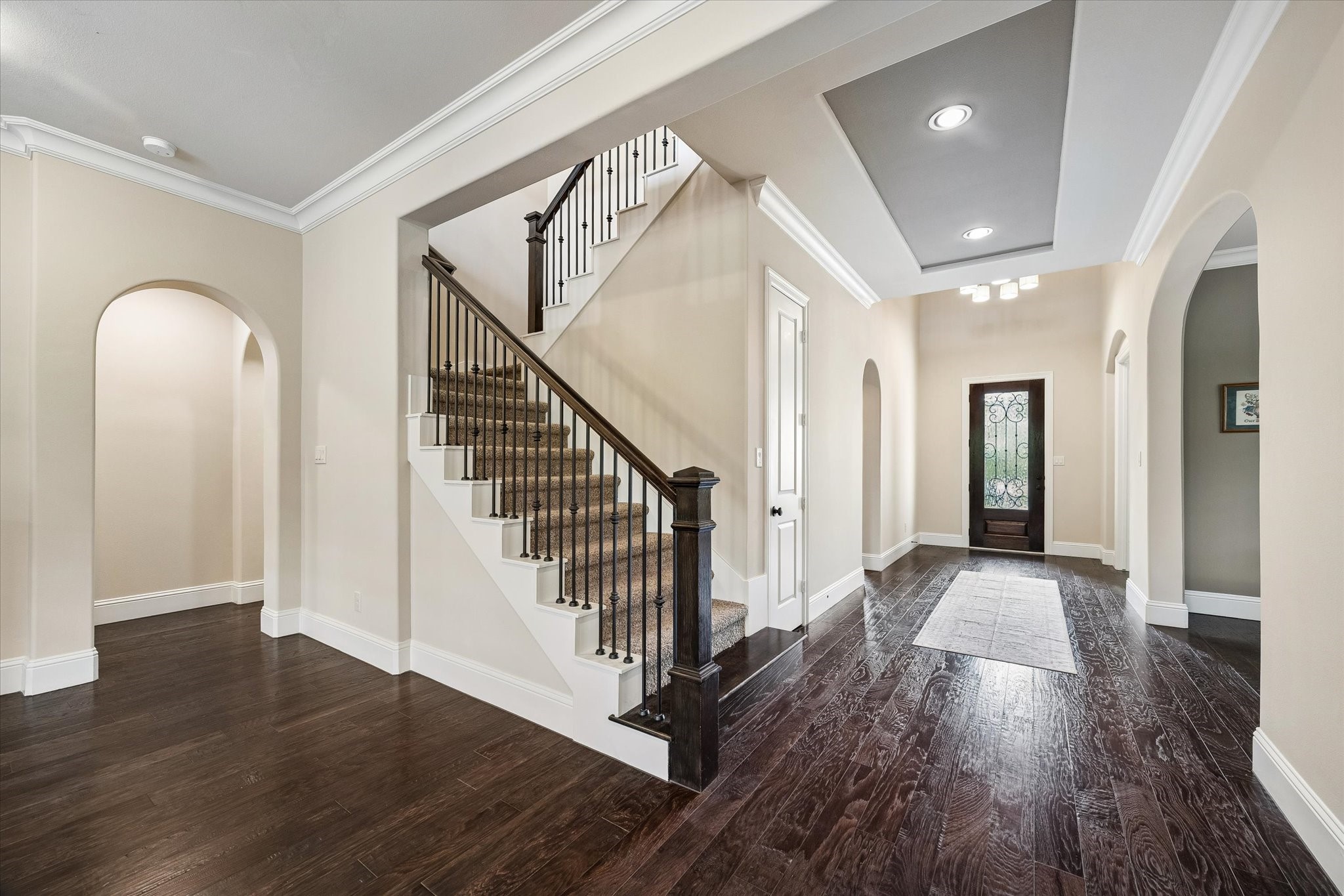 3 Tiburon Court Spring, TX 77389 - Photo 22 of 34 This is where everyday life naturally comes together. From the foyer, you can hear the laughter drifting down from the game room as friends gather for movie night in the media room. Kids race down the stairs on Christmas morning, backpacks are dropped in the mudroom after school, and the staircase becomes the backdrop for first-day-of-school photos and family portraits through the years.