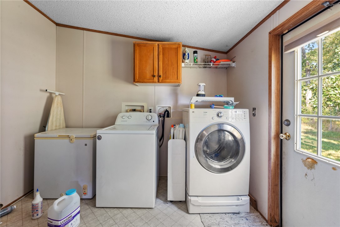 8277 Shady Lane Bryan, TX 77808 - Photo 10 of 21 a utility room with dryer and washer