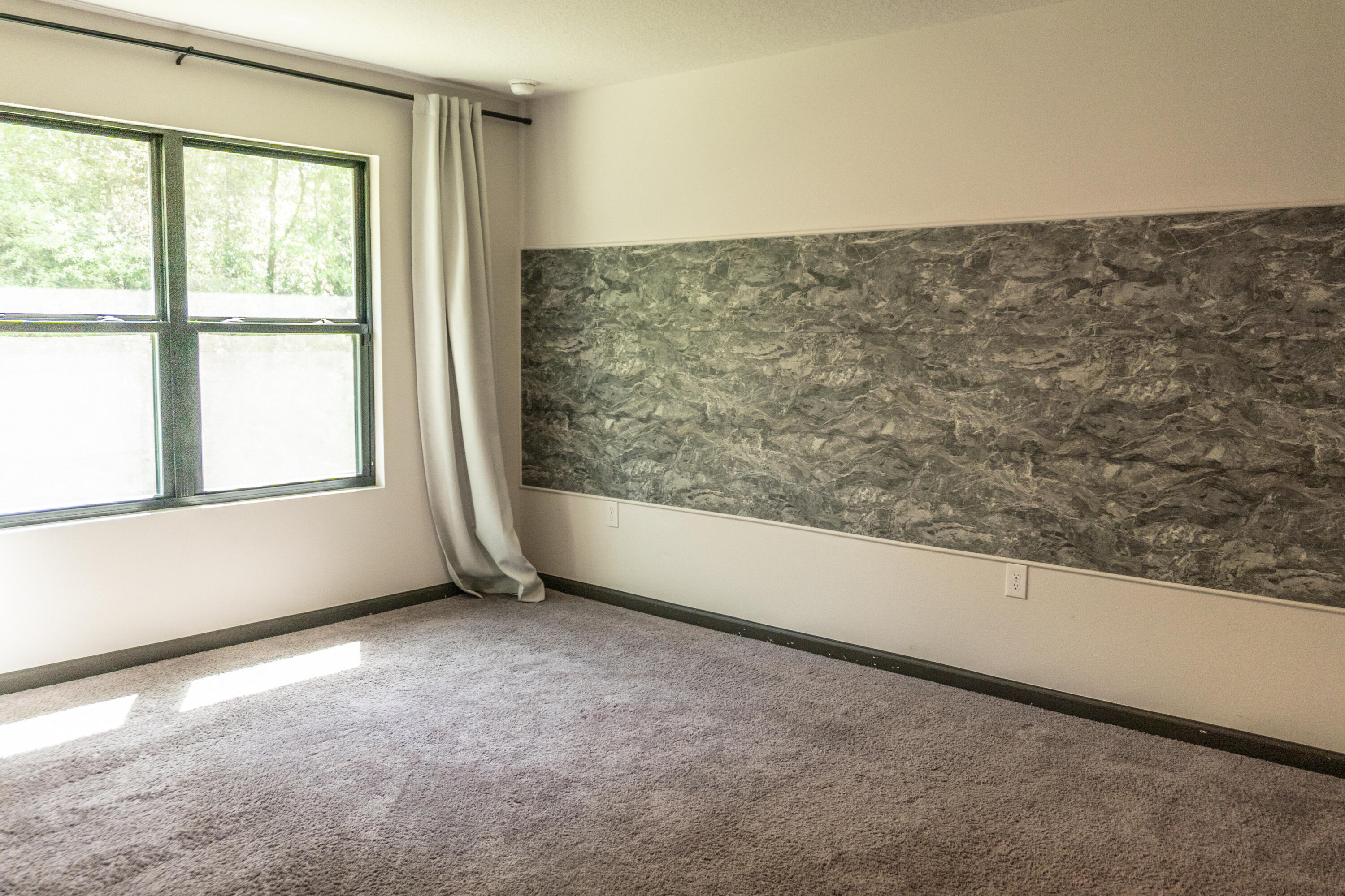 3476 Sparco Drive Crestview, FL 32539 - Photo 18 of 27 an empty room with a window