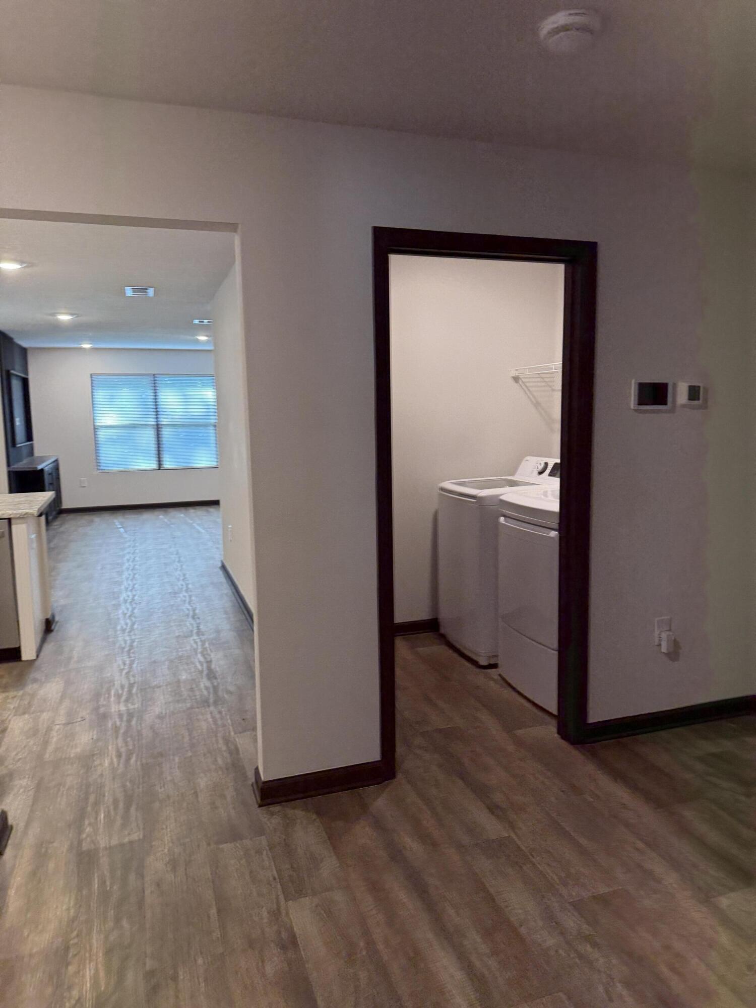 3476 Sparco Drive Crestview, FL 32539 - Photo 5 of 27 a view of a room with wooden floor and a sink