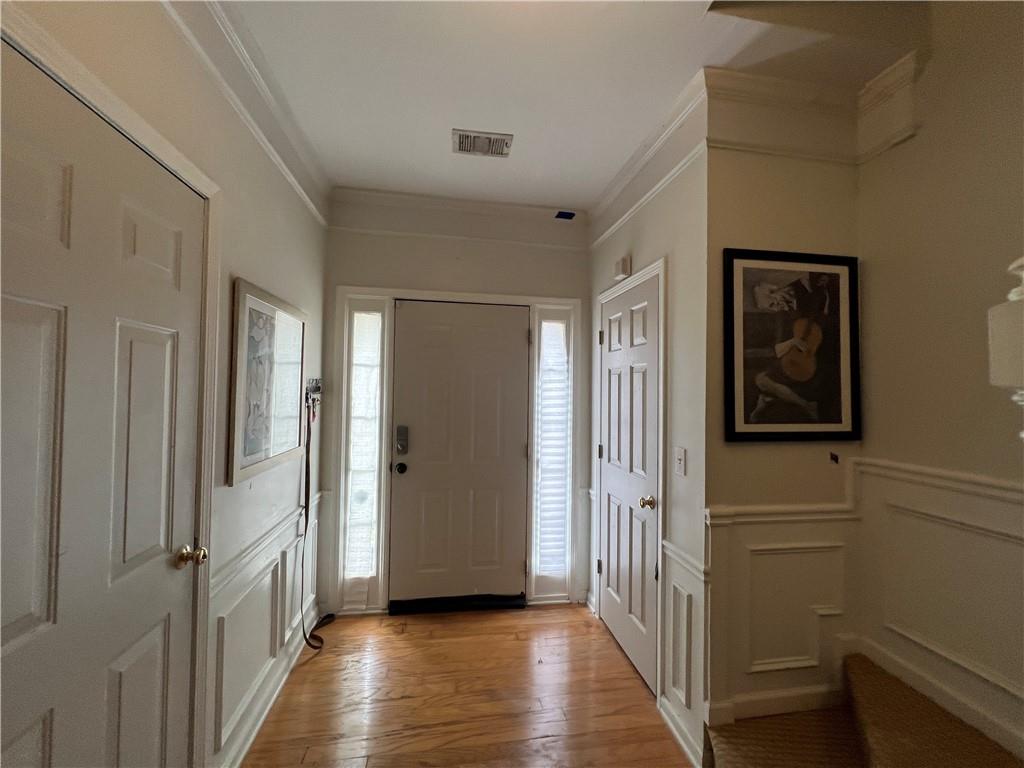 3914 Howell Park Road Duluth, GA 30096 - Photo 21 of 33 a view of a hallway with wooden floor