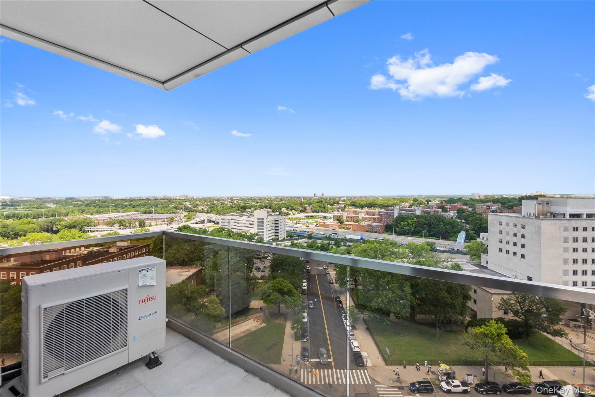 124-28 Queens Boulevard, Unit 11C Queens, NY 11415 - Photo 4 of 14 Balcony with a view of city
