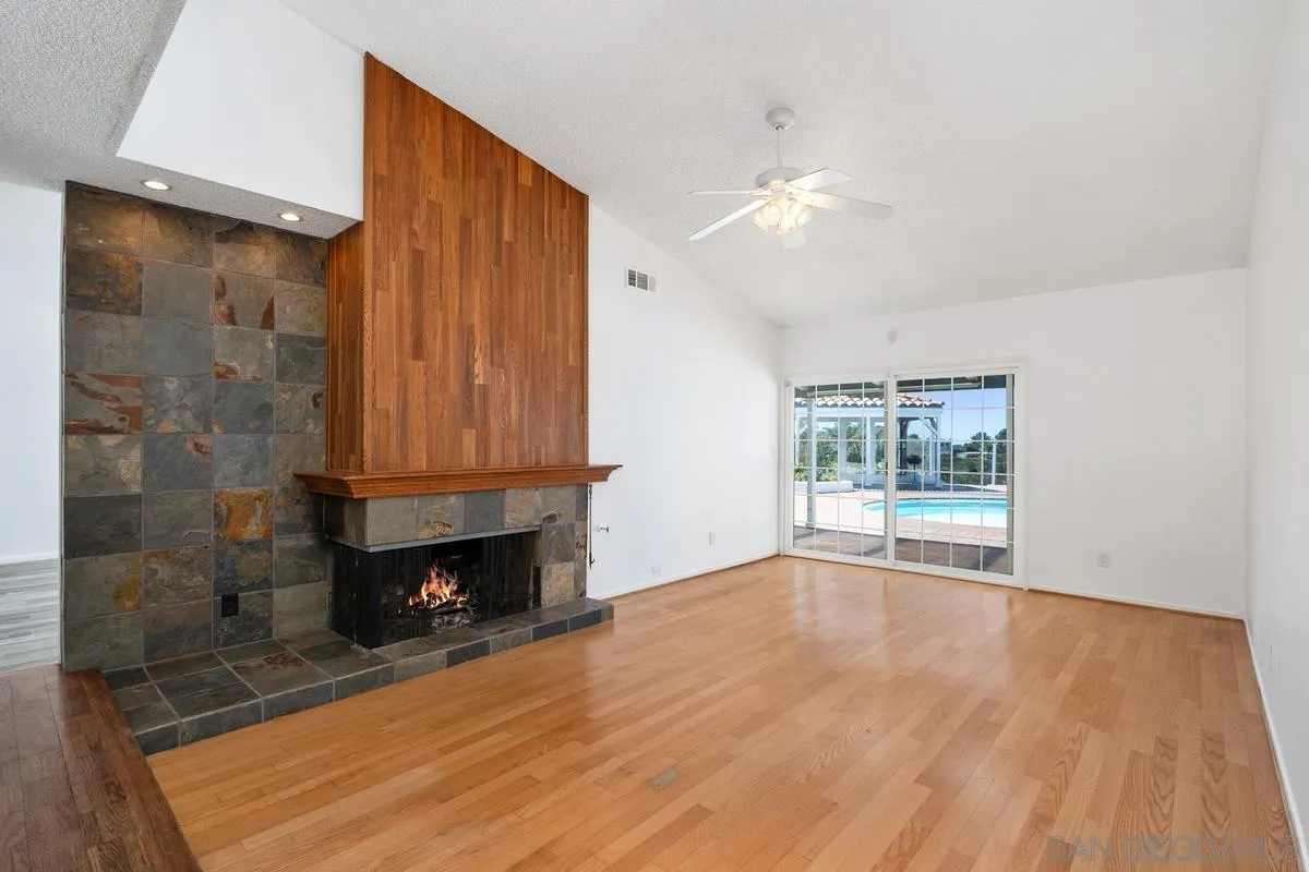 14186 Recuerdo Drive Del Mar, CA 92014 - Photo 13 of 35 a view of a room with wooden floor and window