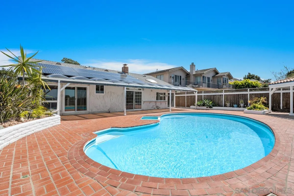 14186 Recuerdo Drive Del Mar, CA 92014 - Photo 24 of 35 a view of a house with pool fire pit and chairs