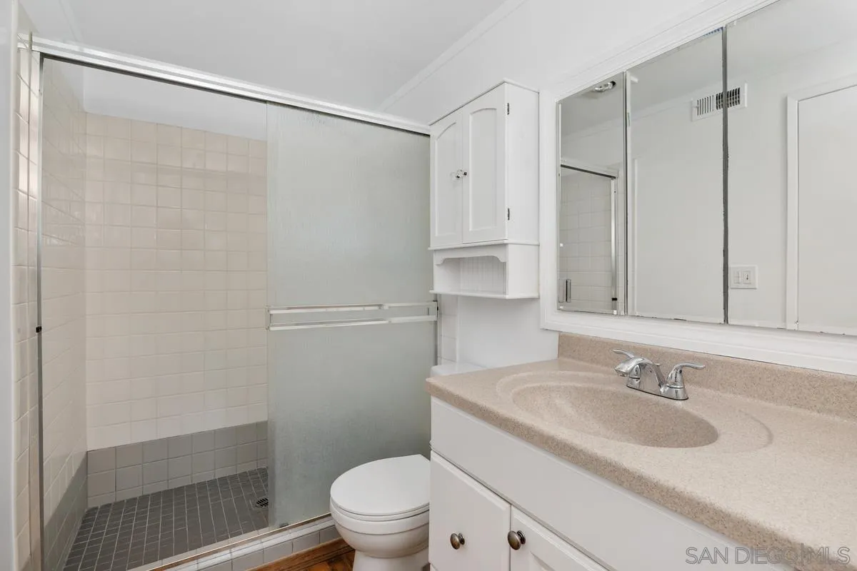 14186 Recuerdo Drive Del Mar, CA 92014 - Photo 31 of 35 a bathroom with a sink toilet and shower