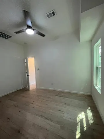 an empty room with window