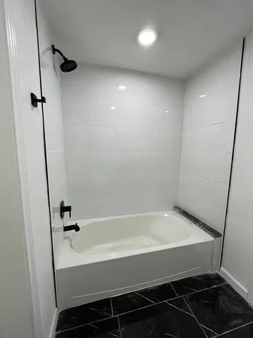 a bathroom with a bathtub