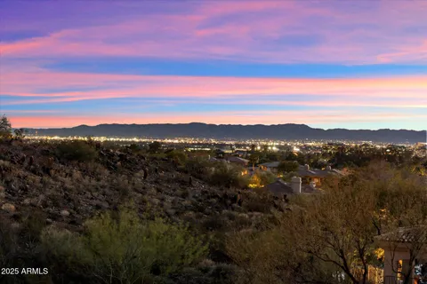a view of a backyard of the house