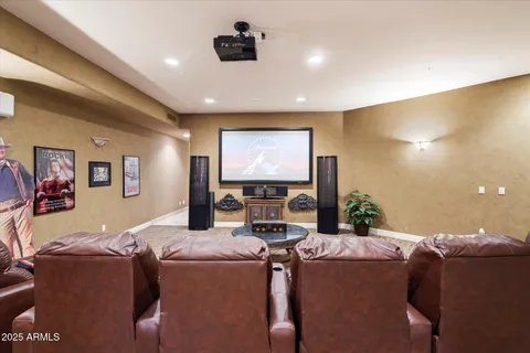 a kitchen with stainless steel appliances granite countertop a sink refrigerator and cabinets