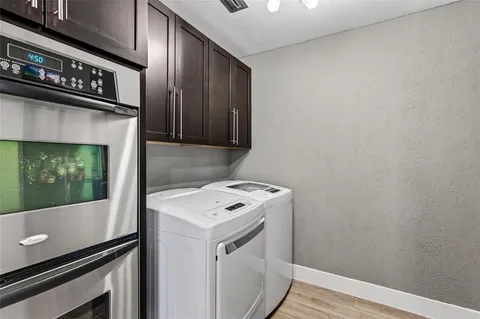 a utility room with washer and dryer